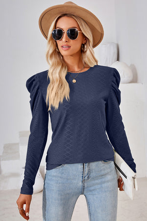 Dark blue textured puff-sleeve crew neck top with diamond pattern