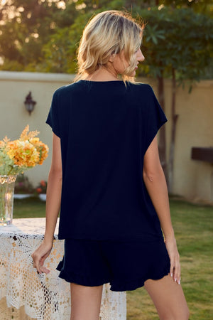 Dark Blue loungewear set with ruffle hem shorts and short sleeve top.