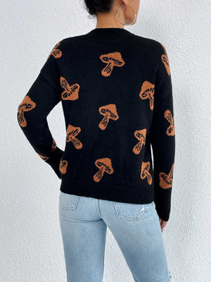 Black knit sweater with allover brown mushroom print, drop shoulder, and crew neck.