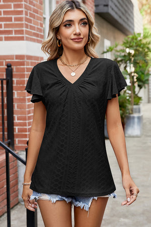 Black flutter sleeve eyelet top with V-neck and textured pattern.
