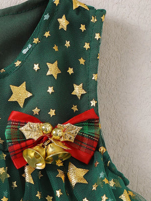 Green tulle baby dress with gold stars and a red plaid bow with bells.