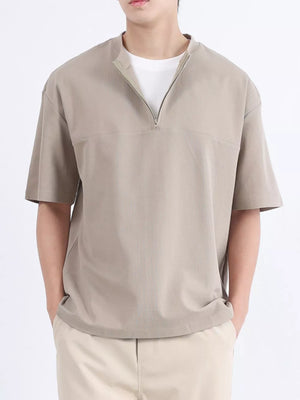 Contemporary men's half-zip t-shirt in Desert Color cotton with a relaxed fit.