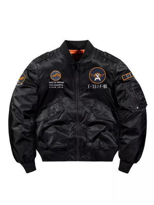 Men's black zip-up bomber jacket with embroidered patches and utility pocket.