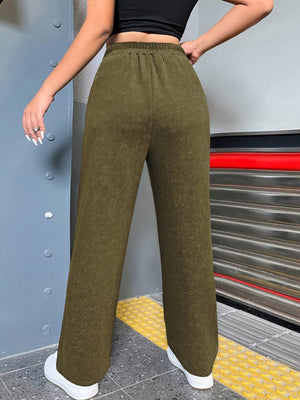 Distressed wide-leg lounge trousers in army green with elastic waist