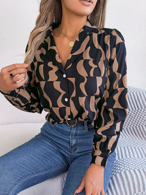 Black and tan abstract wave print silk-touch blouse with button front and collared neckline.