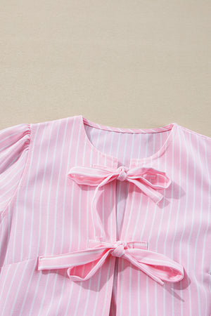 Blush pink striped blouse with bow details and puff sleeves.