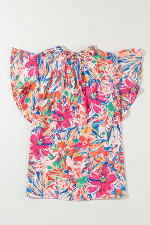 Floral blouse with flutter sleeves and tie-neck detail