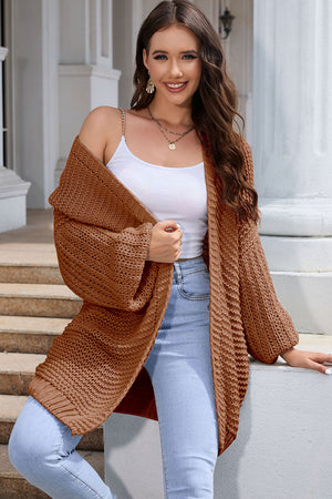 Camel textured knit cocoon cardigan with balloon sleeves and open front.