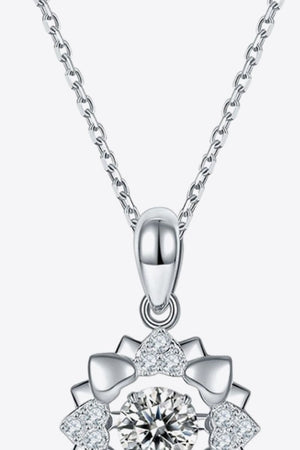 Silver diamond halo necklace with heart details on a sterling silver chain.