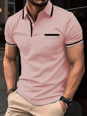 Dusty pink short sleeve polo with black trim on collar, pocket and sleeves.