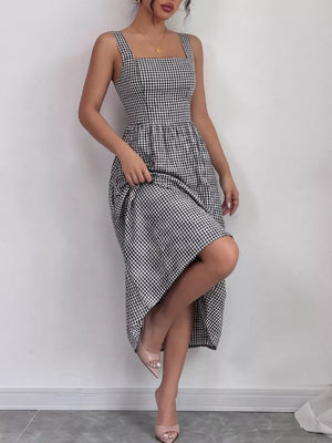 Black and white gingham midi dress with square neckline and a-line skirt.