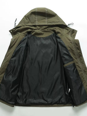 Green hooded jacket, open view showing black patterned lining and interior pocket.