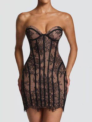 Black lace overlay strapless mini dress with corset detailing and scalloped hem.