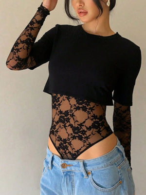 Black lace bodysuit with sheer floral sleeves and torso detail.