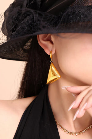Gold sculpted pyramid drop earrings with a polished finish.