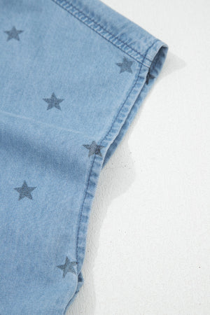 Light blue denim shirt with dark star print and pocket detail.