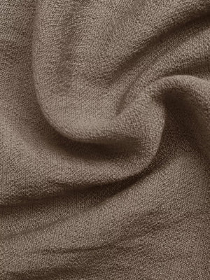 Brown smocked strapless wide-leg romper fabric detail