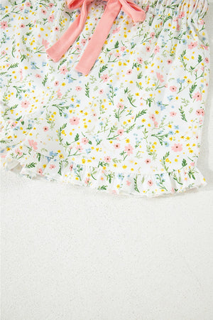 Floral print pajama shorts with ruffle hem and pink bow detail