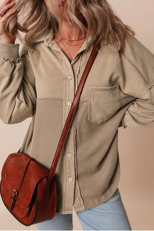 Tan waffle knit overshirt with patch pocket and button front, styled with a crossbody bag.
