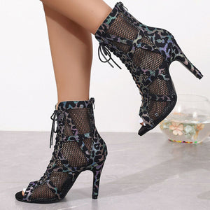 Lace-up peep-toe high heel ankle booties with animal print mesh and black accents.
