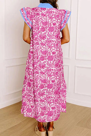 Midi dress with vibrant pink floral print, ruffle sleeves, and blue trim.