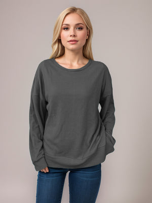 Dark Gray waffle knit relaxed fit crewneck top with long sleeves and a dropped shoulder.