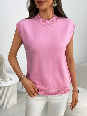 Pink ribbed knit sleeveless mock neck top with a relaxed fit.