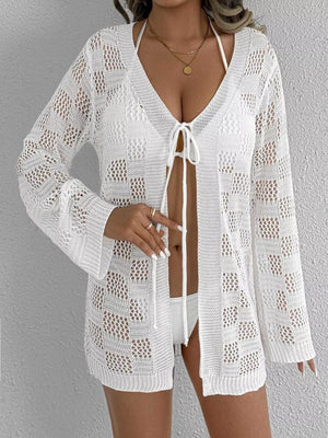 White openwork crochet tie-front cover-up with bell sleeves and a V-neck.