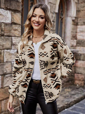 Aztec sherpa zip-up jacket in tan with a geometric pattern and stand-up collar.