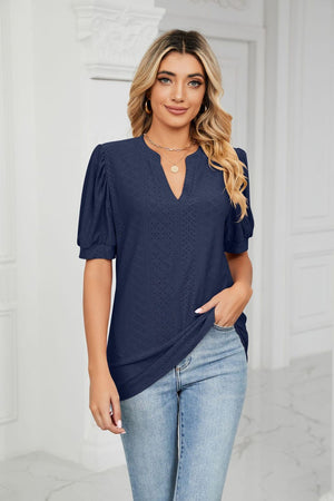 Dark Navy perforated puff sleeve blouse with keyhole neckline and textured pattern.