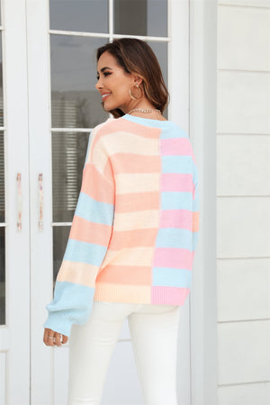 Pastel block stripe crewneck pullover sweater in orange, blush pink, and light blue acrylic.