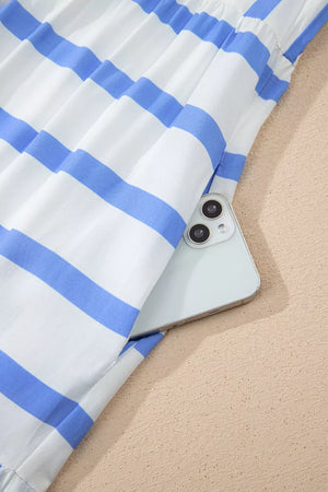 Tiered blue and white striped vacation dress with ricrac trim and side pocket detail.