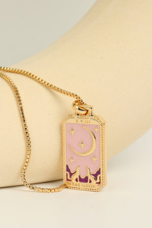 Celestial tarot pendant necklace in Moon color with crescent moon and stars design on pink enamel.