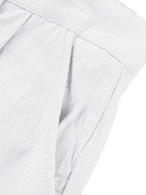White relaxed fit sweatpants with pleats and pocket detail