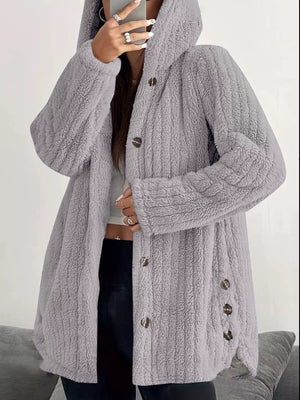 Cozy button-up fleece jacket in light grey with a hood and dark buttons.