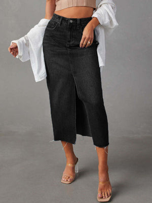 Dark denim midi skirt with raw hem and front slit, buttoned waist.
