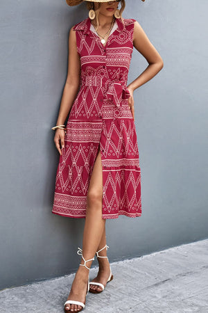 Deep Red geometric print sleeveless midi dress with tie waist and button front.