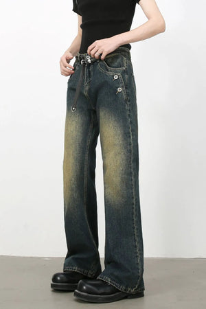 Dark wash bootcut jeans with faded details and button accents.