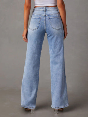 Panel seam wide leg jeans in light wash denim with a high rise and flared hem.