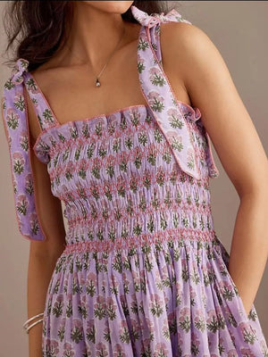 Lilac floral midi dress with smocked bodice and tie shoulders