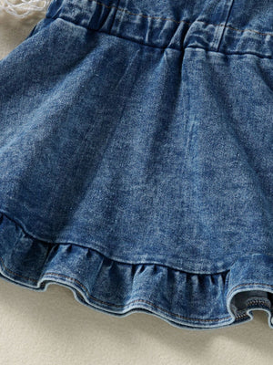 Adjustable denim overall dress for kids with ruffled hem and elastic waistband.