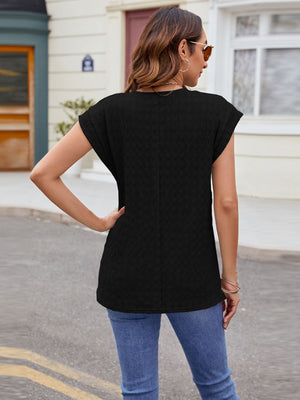 Black textured cap-sleeve tee with subtle knit, casual style.