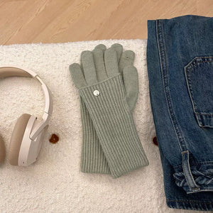 Convertible ribbed knit touchscreen gloves in green with a button detail.