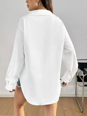 White long sleeve button-up maternity shirt with classic collar and curved hem.