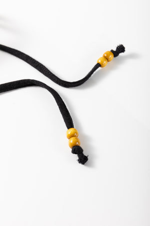 Black blouse drawstring with wooden beads and tassel detail