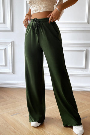 Textured rib wide-leg drawstring trousers in dark blue with a relaxed fit and comfortable elastic waistband.