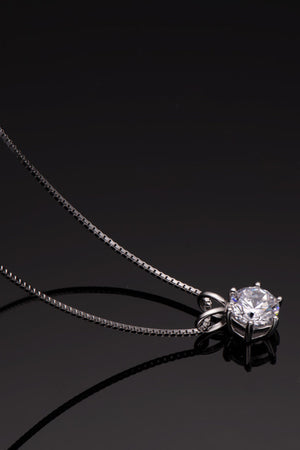 Silver moissanite pendant necklace with 1 carat round brilliant cut stone on 925 silver box chain.