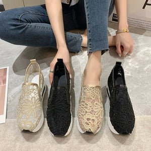 Lace mesh slip-on flats in khaki and black with comfortable platform soles.