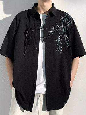 Black relaxed fit men's shirt with bamboo print and toggle closure