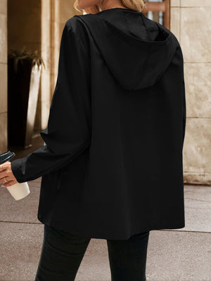 Black zip-through hooded jacket with long sleeves and a casual cut.